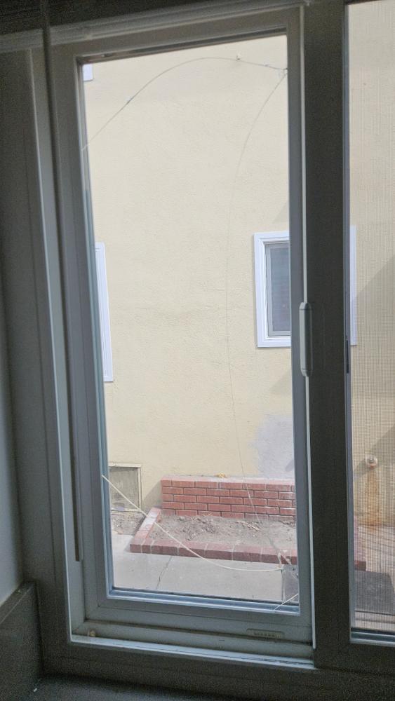 Milgard Window With Stress Crack Curved Line