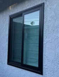 Milgard Black Trinsic Sliding Window With ZBar Retrofit Flange